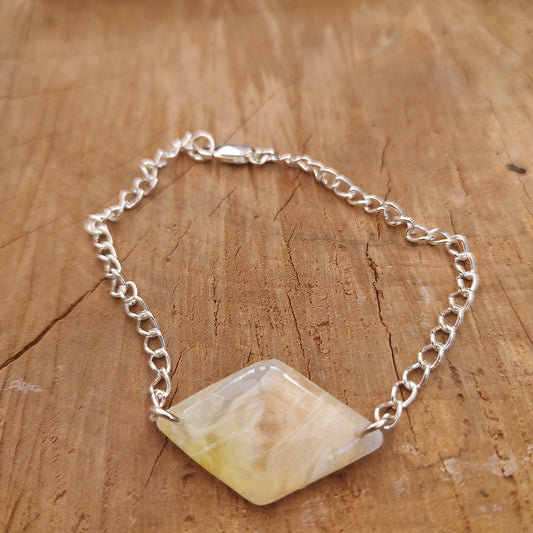 Sunshine Collection:  Pale Yellow and Cream diamond shaped focal bead on silver plated chain bracelet