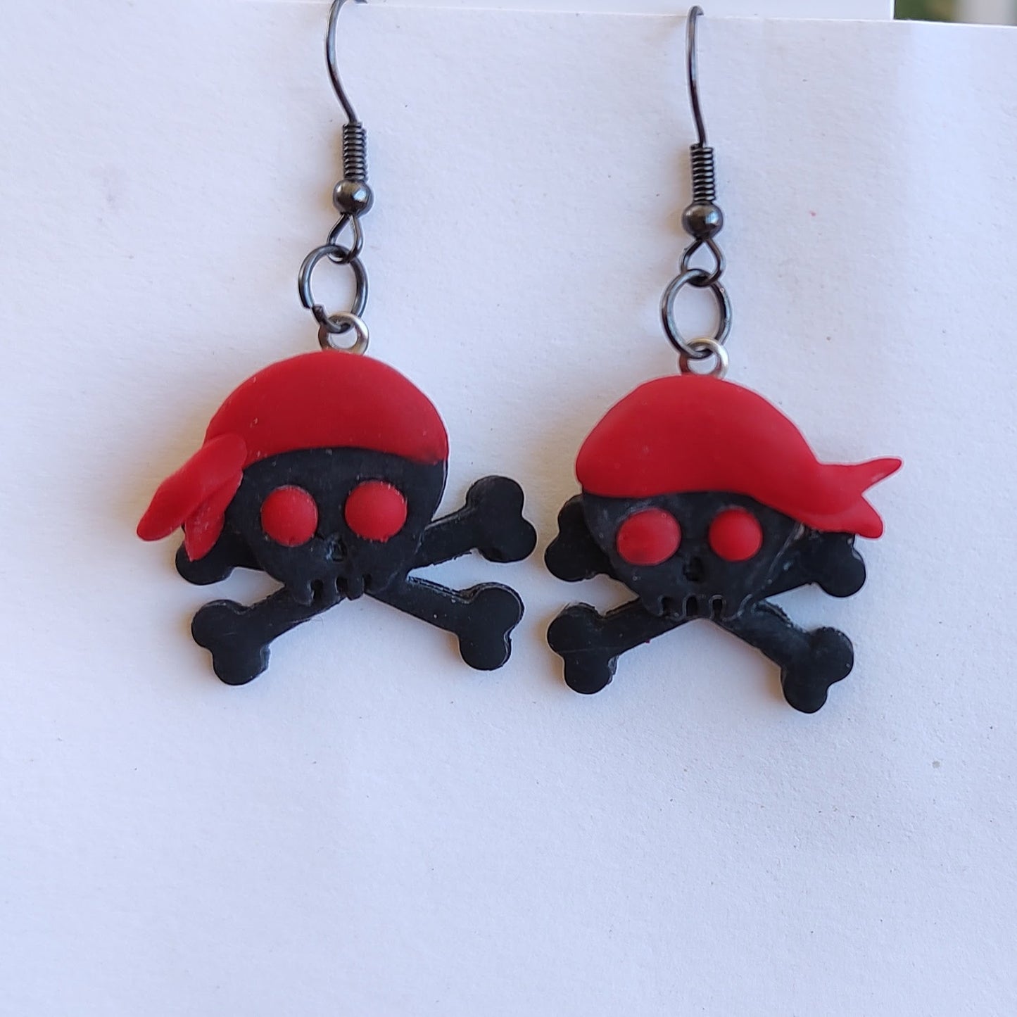 Ahoy Pirates and Wenches Skull and Crossbones with red skull cap earrings