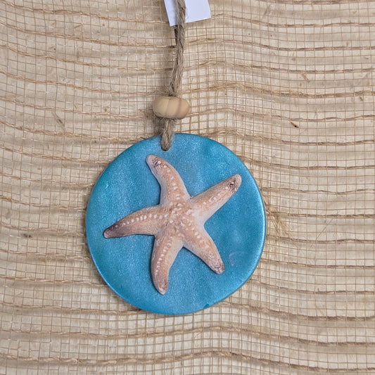 Beachy Vibe Holiday Ornament with Starfish on Deep Blue See Background