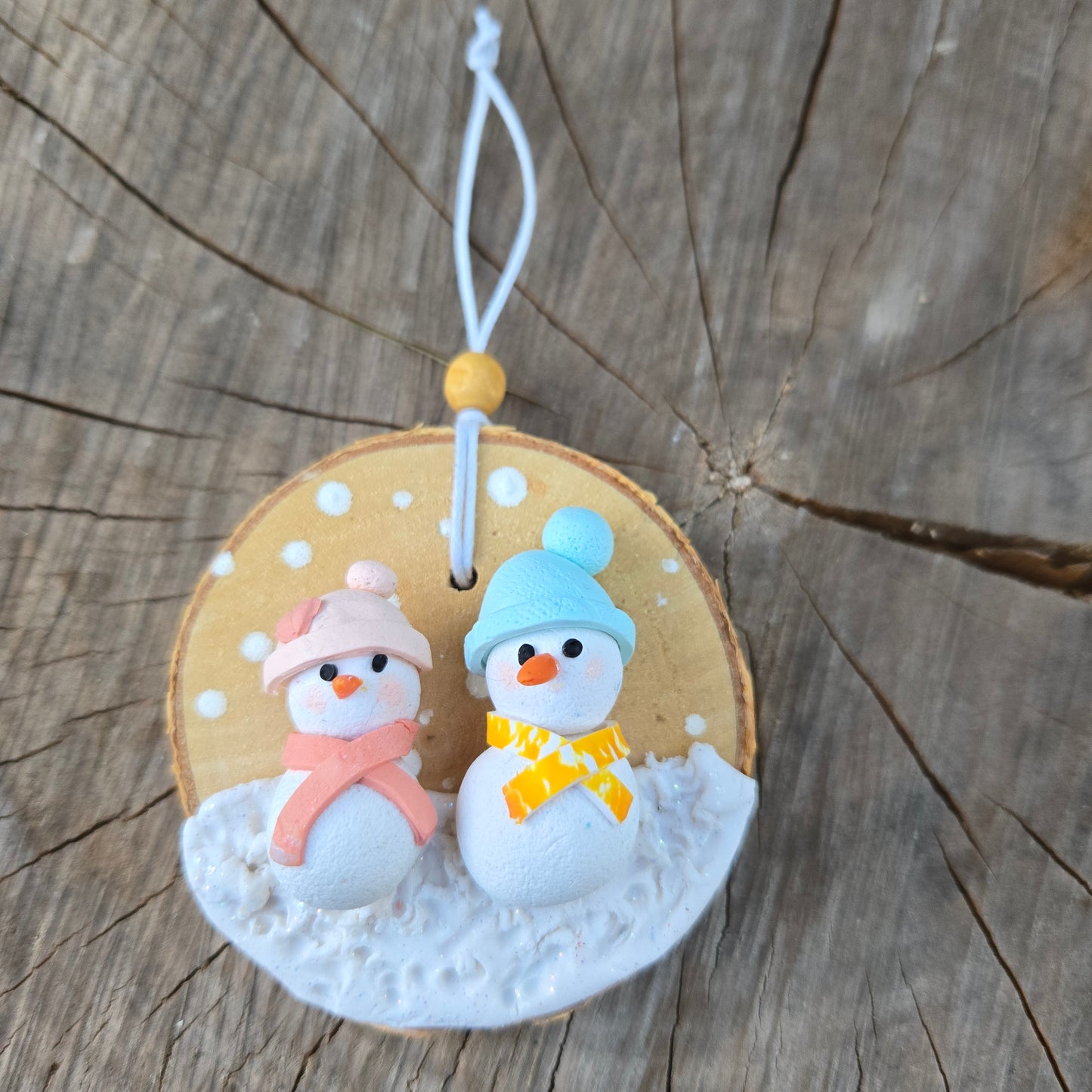 Snowman and Snowwoman Christmas Ornament on Wood