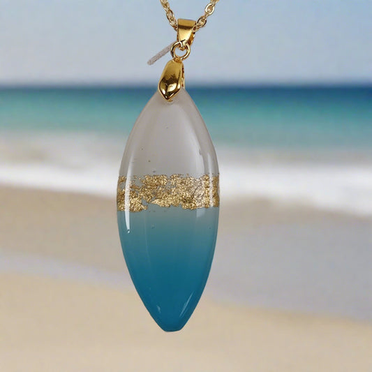 Oval pendant, Sky blue, Sand and Gold accents.  Pick your favorite from different styles