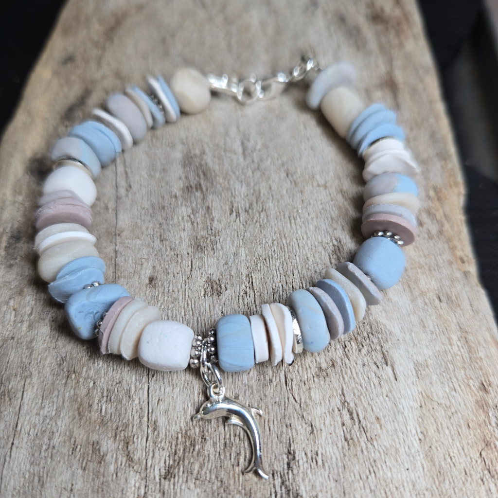 Polymer clay bracelet with dolphin charm
