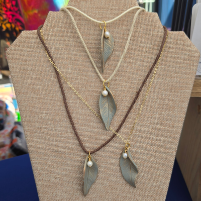 Group of green leaf with pearl pendants